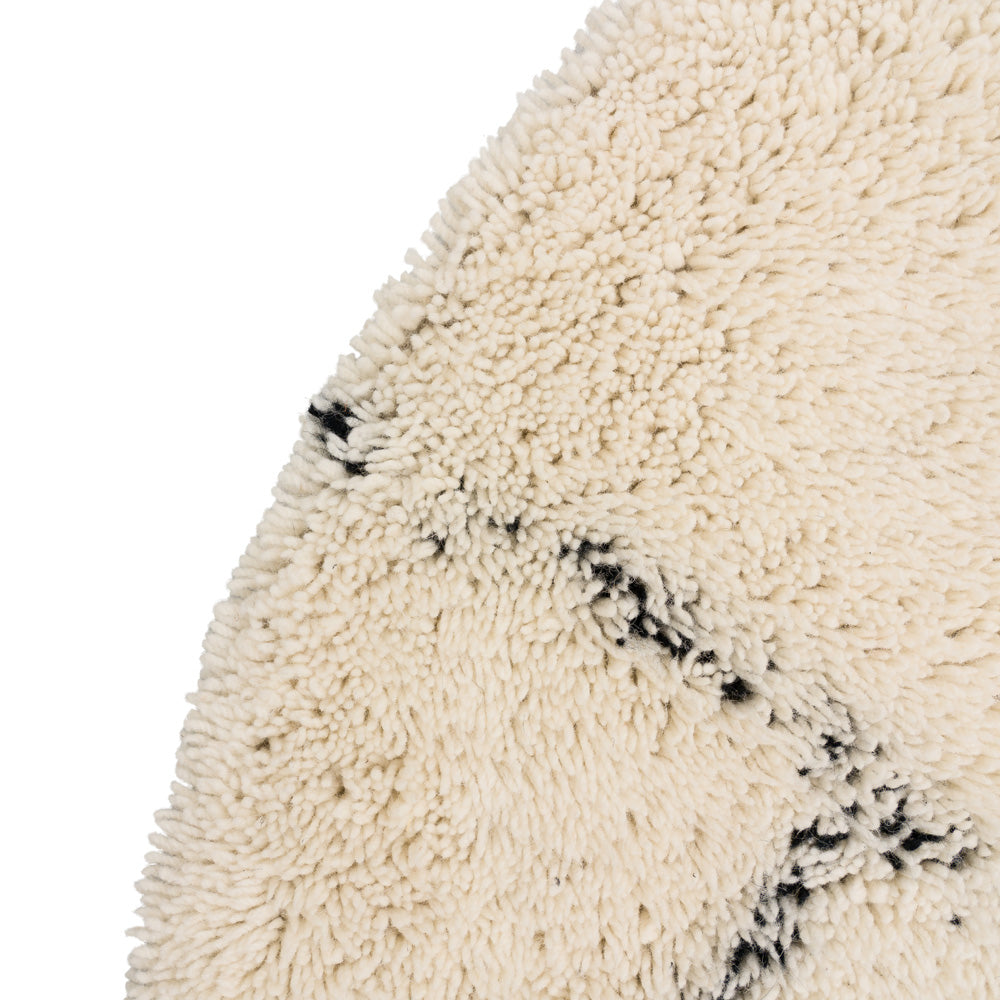 Amine runder Wollteppich